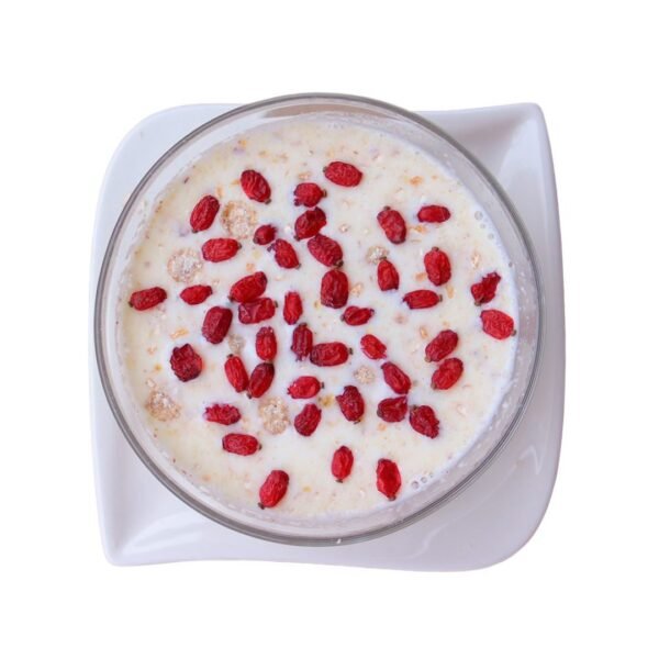 Persian rice dessert topped with dried barberries
