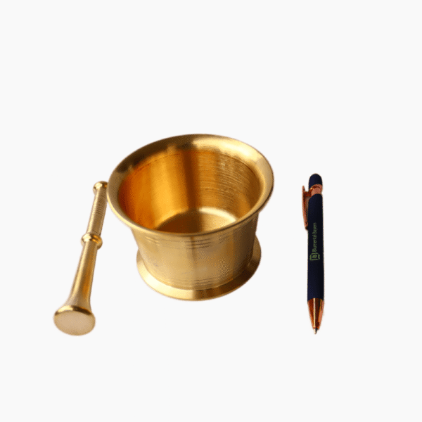Brass mortar with pestle, side view